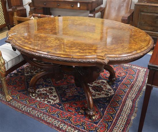 A Victorian oval figured walnut centre table L.150cm